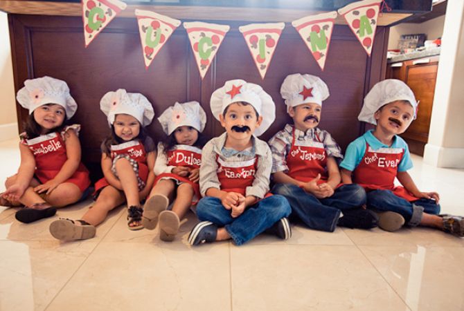 Crianças em festa infantil com tema pizza Crianças em festa infantil com tema pizza