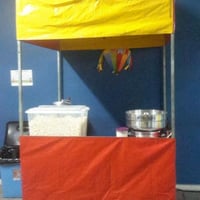 Barraquinha de guloseimas,pipoca e algodão doce,cachorro quente,churros,crepes e outros