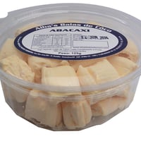 Bala de coco SABOR ABACAXI recheada com leite condensado e fruta.