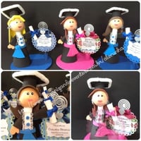 Lembrancinha formanda Personalizada em EVA,medindo 15 cm.
Feito todos os cursos.