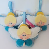 Lembrancinha Confeccionada em Feltro modelo Anjinho.
Com enchimento em manta siliconada.
Aco