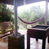 Área com rede, balança namoradeira, mesa de bilhar e pebolim
