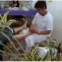 Reflexologia podal em evento do dia da mulher na Igreja Messiânica da Curicica/RJ.