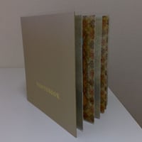 livro de anotações encadernado com capa Ouro Escovado, gravação em dourado