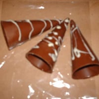 Cones de Chocolate pondendo ser recheados também unidade R$:1,50 atacado R$:1,10
