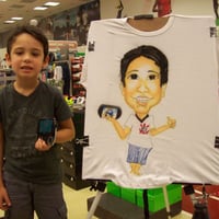 caricaturas ao vivo com aerógrafo em camisetas