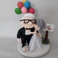 CARL E ELLIE