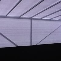 cobertura toda fechada com baguns e uma lateral com plastico na frente