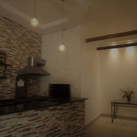 Bar. Área para drinks com balcão em alvenaria no formato e L e com espaço para as mesas bistrô e cad