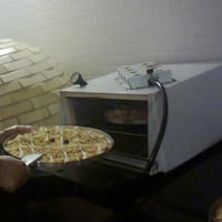 assando pizza em evento ate 20 pessoas