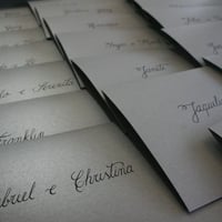 caligrafia | tinta preta em papel prata